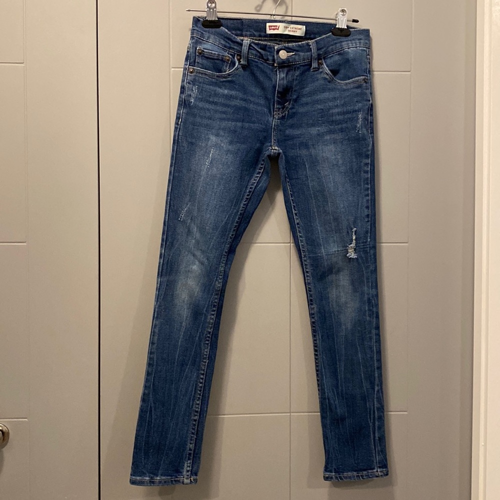 Levi’s 519 Extreme Skinny jeans. 14 Reg. W27 L29 Distressed dark denim.
